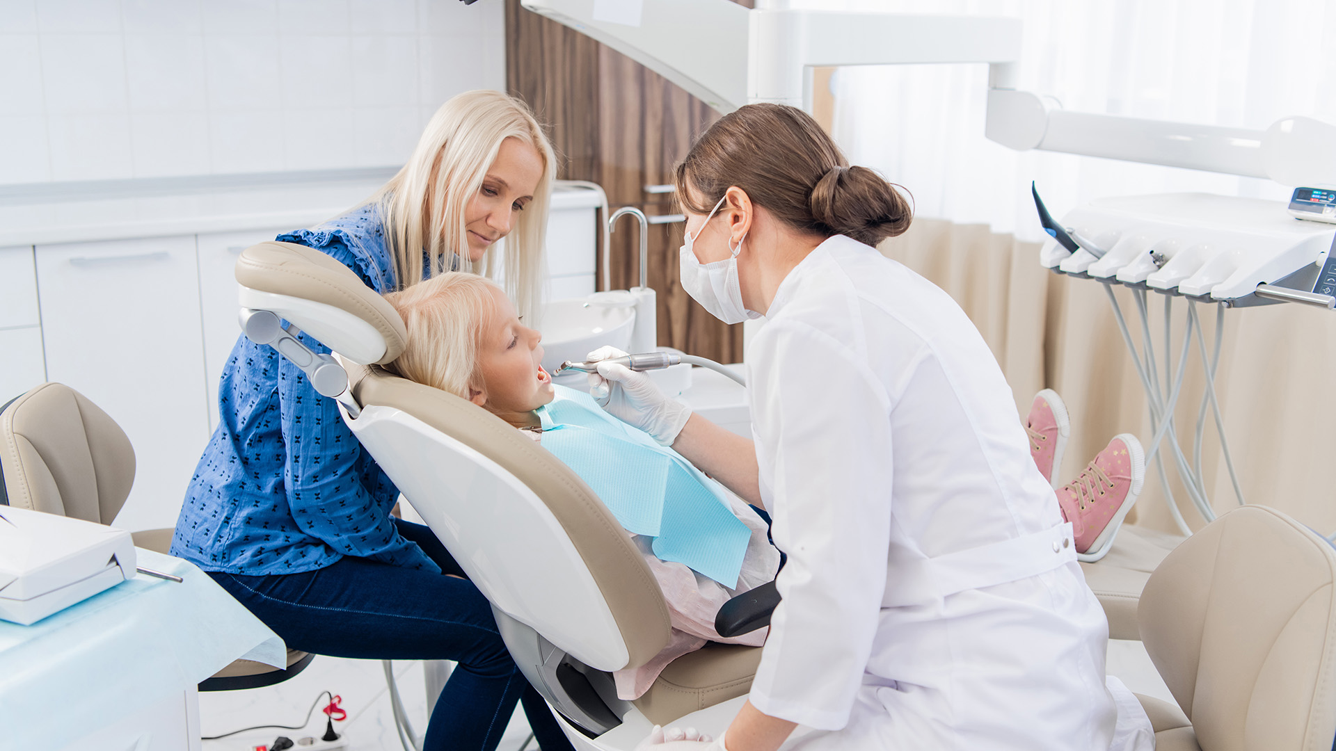 A child receiving gentle dental treatment at Springfield Dental Care in Springfield, VA